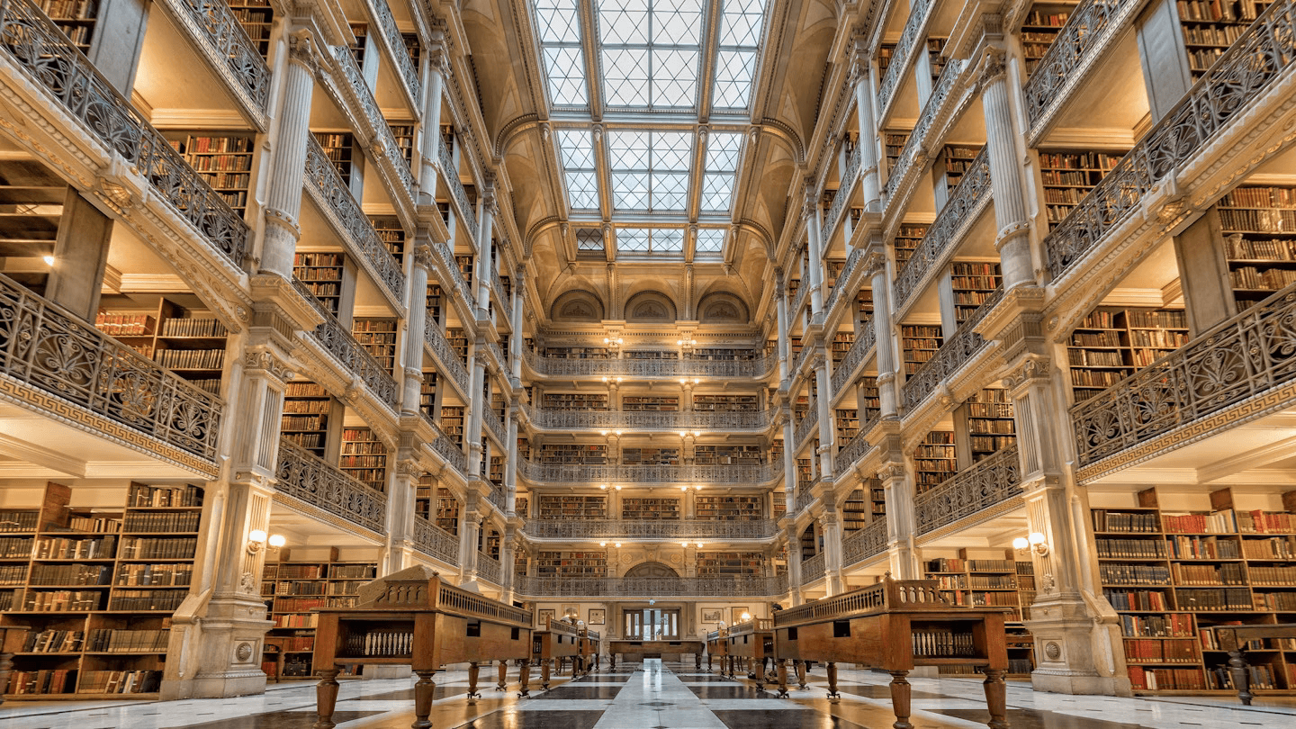 Grand library with multiple levels of bookshelves